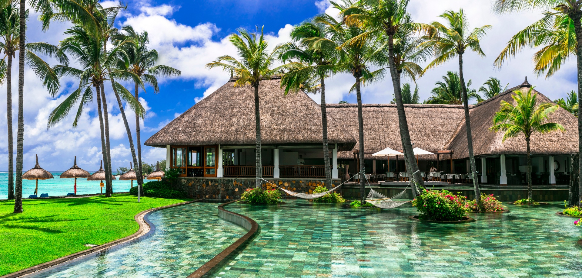 beach resort with pool and hammocks